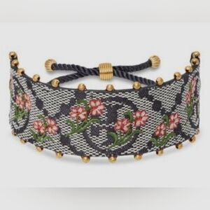 Tory Burch T Monogram Logo & Floral Embroidery rolled brass navy Slider Bracelet